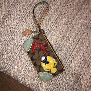 Limited edition fish and coral appliqué wristlet